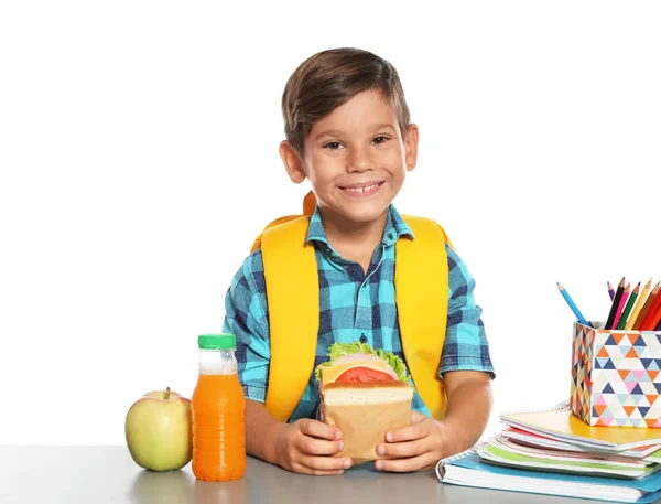 Schoolboy Healthy Food Backpack Sitting Table White Background — Stock Photo, Image