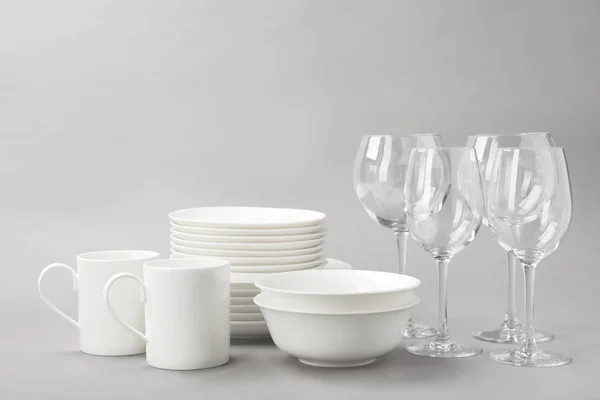 Set Clean Tableware Grey Background Washing Dishes — Stock Photo, Image
