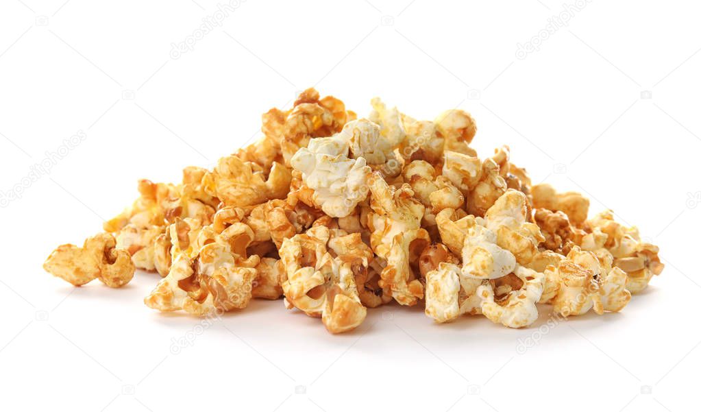 Pile of delicious caramel popcorn on white background