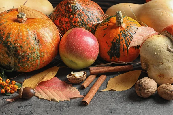 Samenstelling Met Verschillende Pumpkins Grijze Tafel Herfstvakantie — Stockfoto