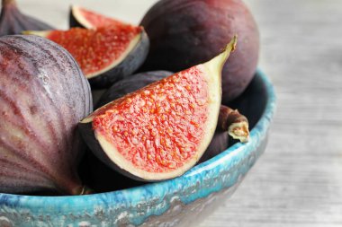 Tablo, closeup taze olgun incir ile top. Tropikal meyve