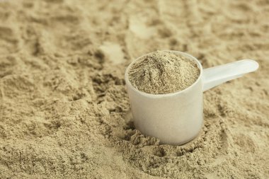 Kaşık ve kenevir protein tozu, closeup ölçme. Superfood