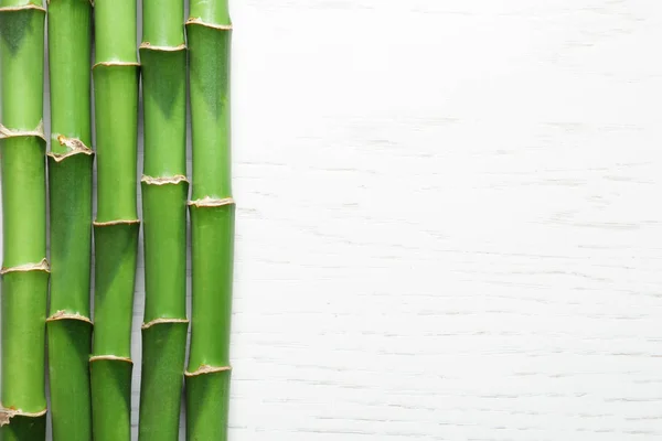 Green Bamboo Stems Space Text Wooden Background Top View — Stock Photo, Image