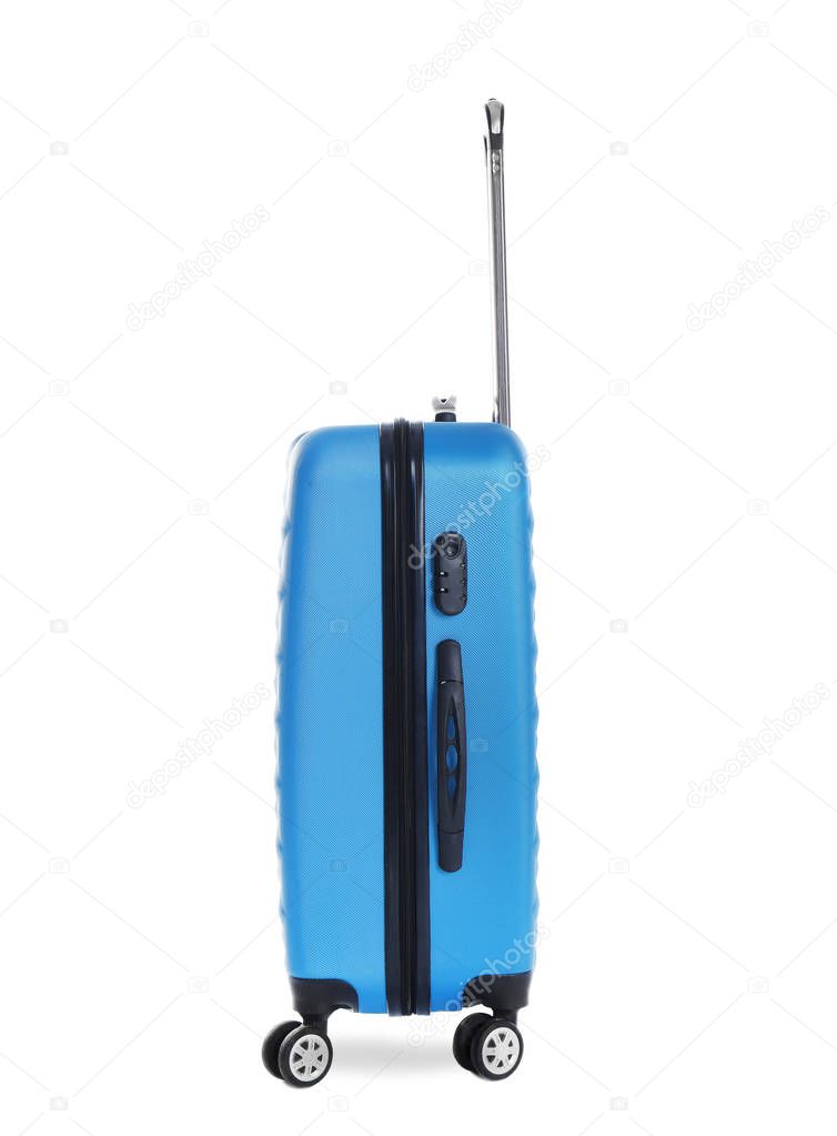 Blue suitcase for travelling on white background