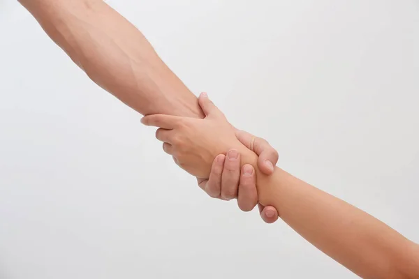 People Holding Hands Together Light Background Concept Support Help — Stock Photo, Image