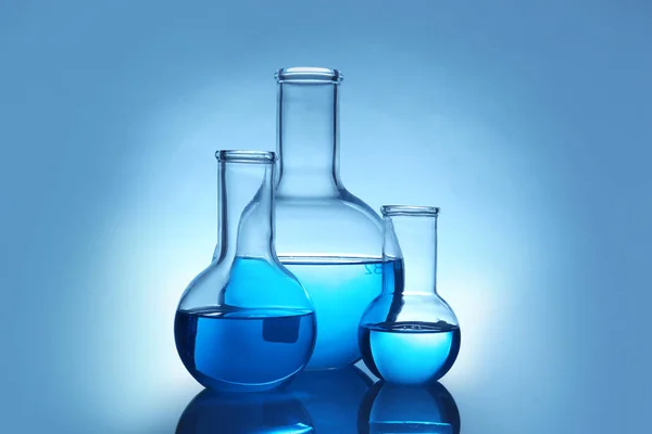 Flasks Liquid Table Color Background Laboratory Analysis Stock Image