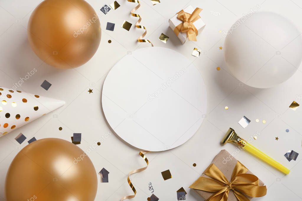 Flat lay composition with party accessories and space for text on light background