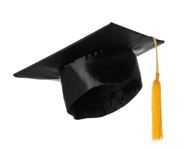白で隔離ゴールドのタッセル付き卒業帽子 — ストック写真