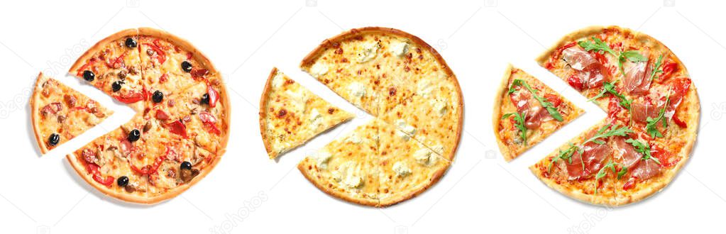 Set with different delicious pizzas on white background, top view