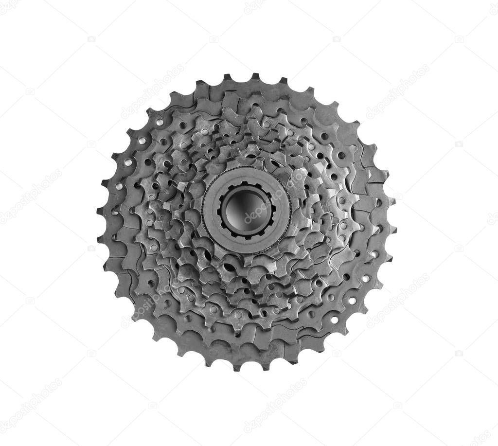 Modern bicycle cogset on white background, top view