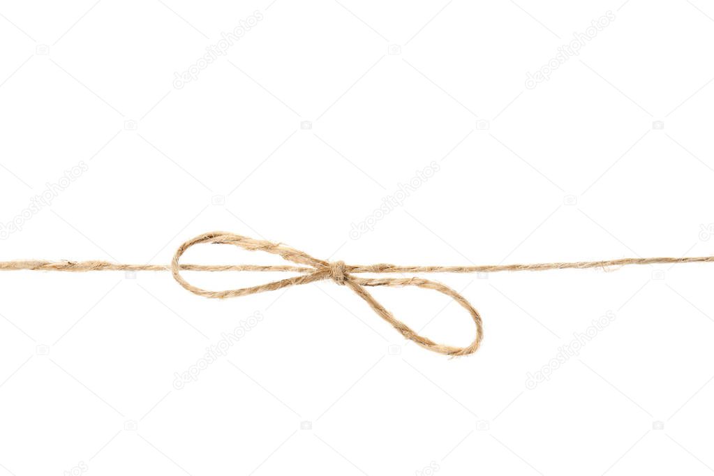 Hemp rope with bow knot on white background