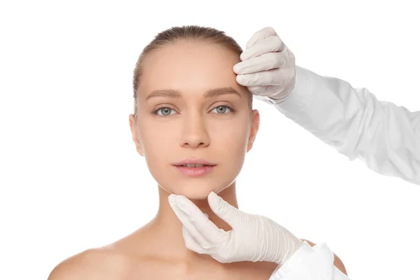 Doctor Examining Young Woman Face Cosmetic Surgery White Background — Stock Photo, Image