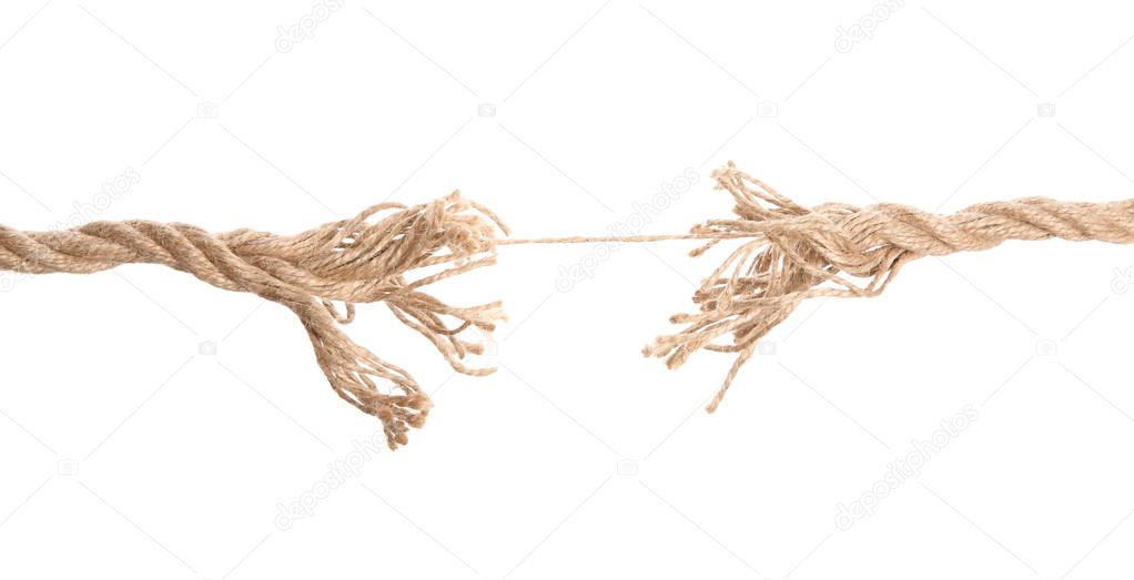 Frayed rope at breaking point on white background