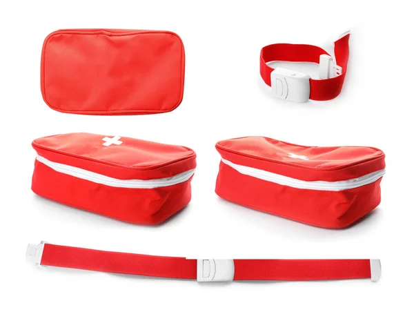 Set with first aid bag and tourniquet on white background. Medical objects