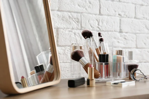 Organizer Cosmetic Products Makeup Table Brick Wall — Stock Photo, Image