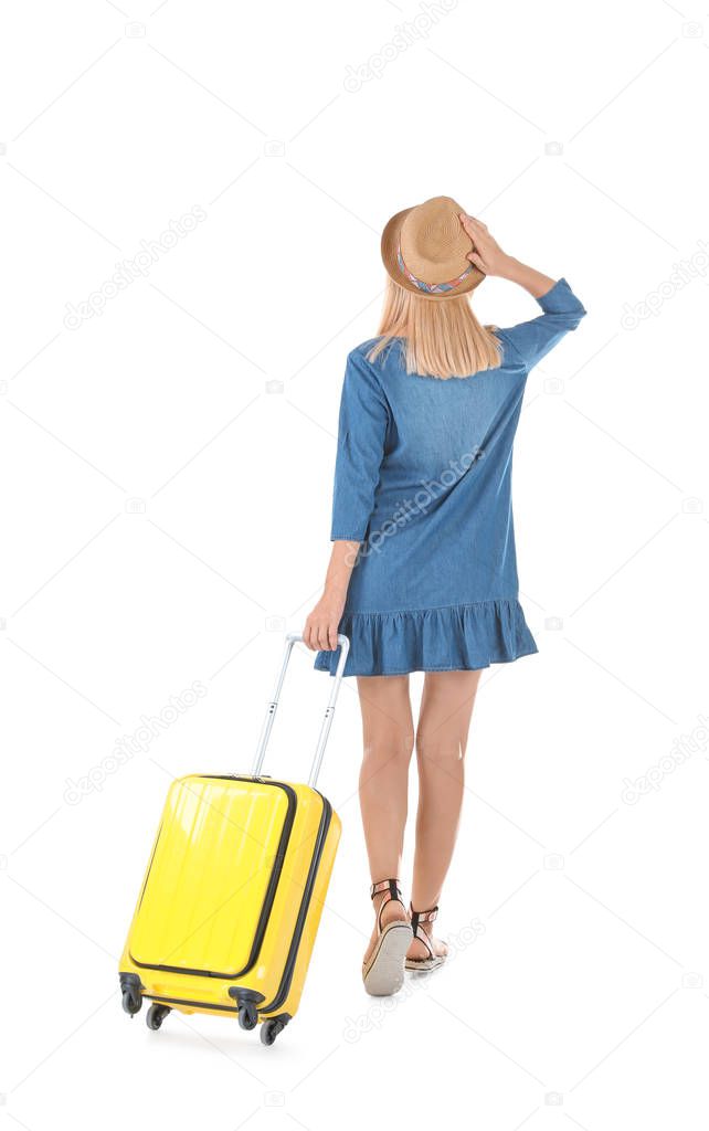 Woman with suitcase on white background. Vacation travel