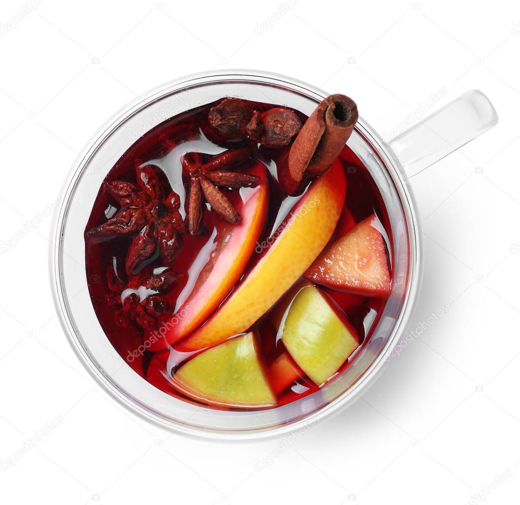 Cup with red mulled wine on white background, top view