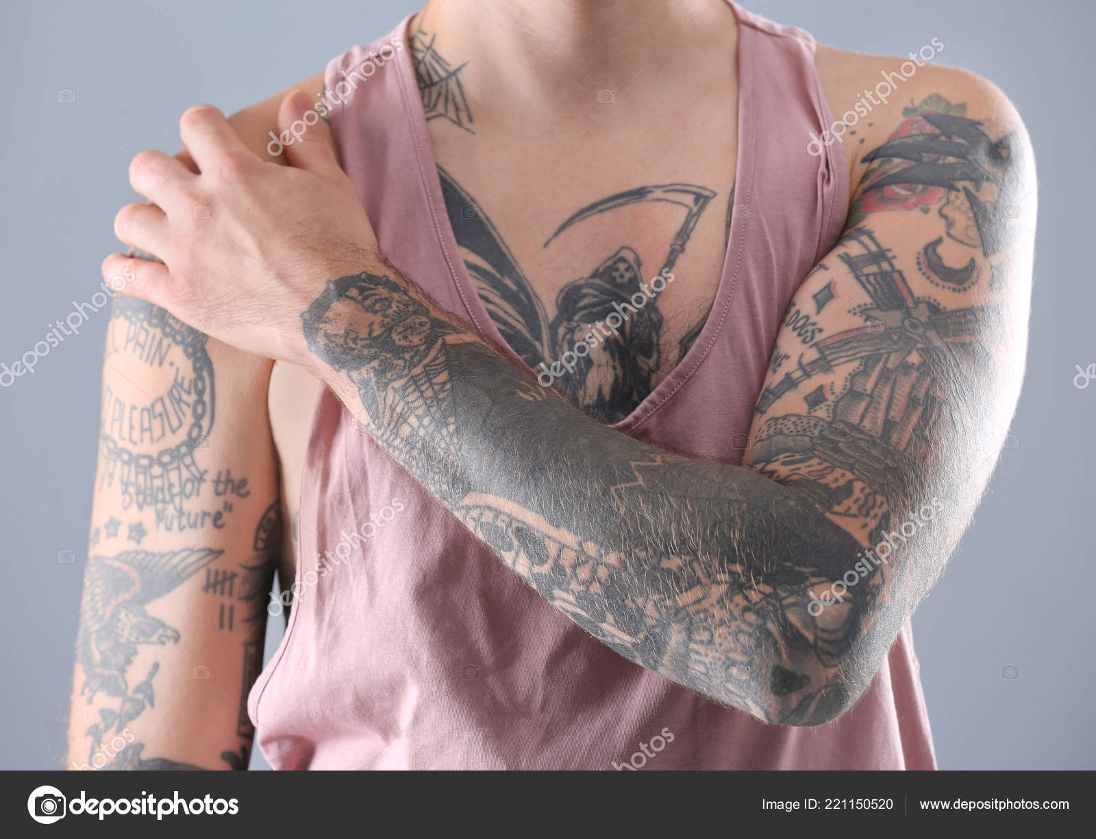 man showing stylish tattoo with Ukrainian trident on finger, isolated on  beige background Stock Photo by msvyatkovska