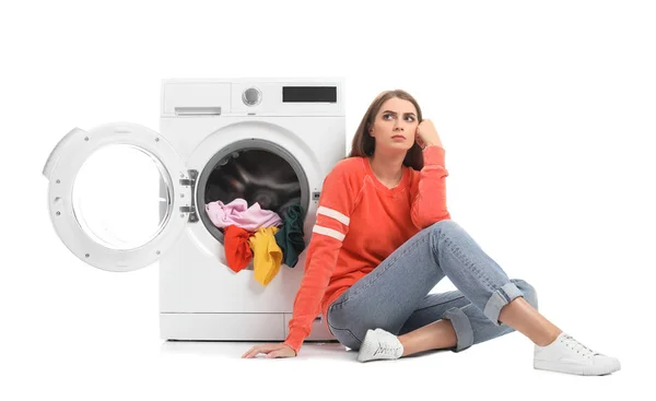 Young Woman Sitting Washing Machine Dirty Laundry White Background — Stock Photo, Image
