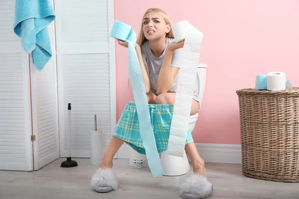 Woman Paper Rolls Sitting Toilet Bowl Bathroom — Stock Photo, Image