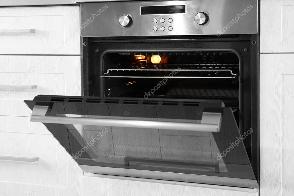 Open modern oven built in kitchen furniture