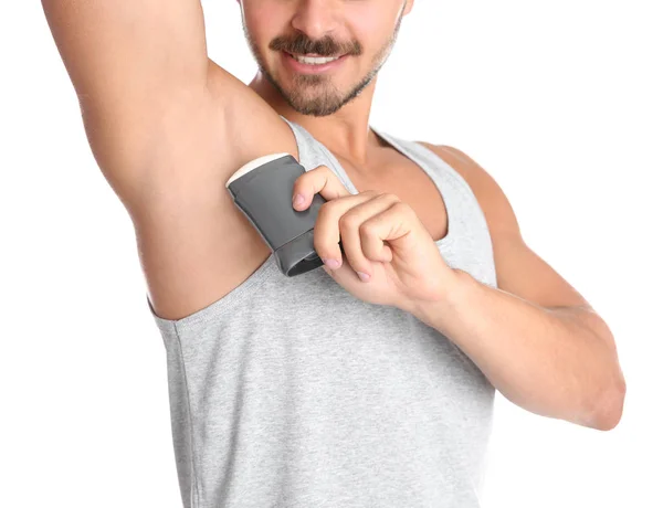 Ung Man Använder Deodorant Vit Bakgrund Närbild — Stockfoto