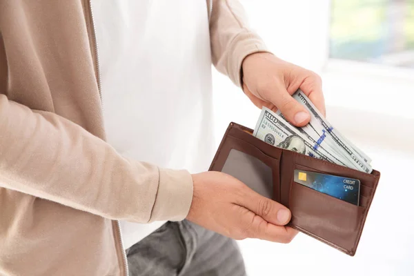 Man Holding Wallet Money Blurred Background Closeup Stock Image