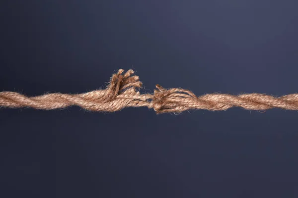 Stretched Frayed Rope Breaking Dark Background — Stock Photo, Image