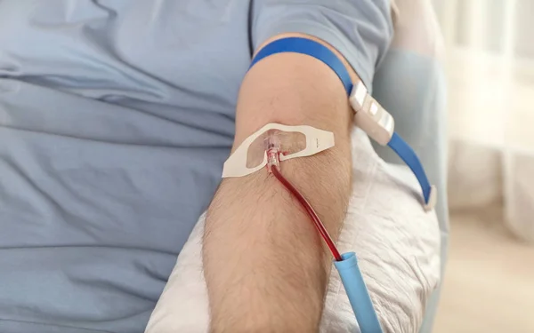 Man donating blood to save someone\'s life in hospital