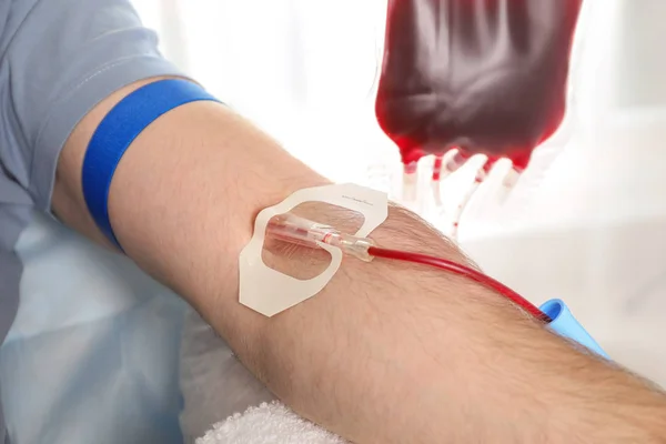 Man donating blood to save someone\'s life in hospital