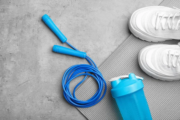 Flat Lay Composition Jump Rope Gym Equipment Space Text Grey — Stock Photo, Image