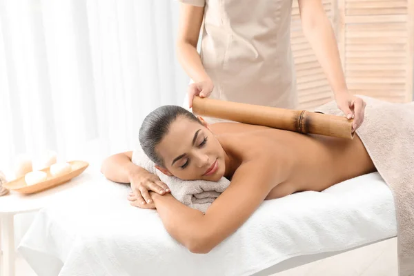 Young Woman Having Massage Bamboo Stick Wellness Center — Stock Photo, Image