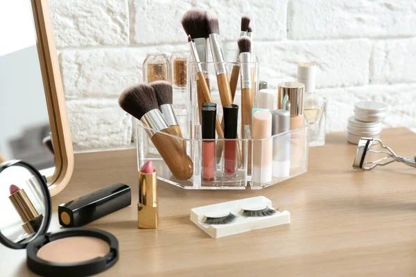Organizer Cosmetic Products Makeup Table Brick Wall — Stock Photo, Image