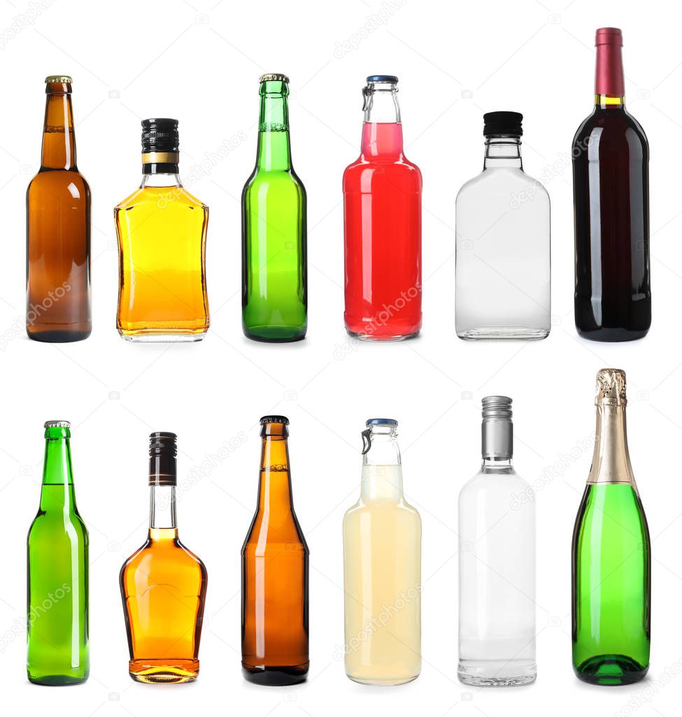 Set of bottles with different drinks on white background