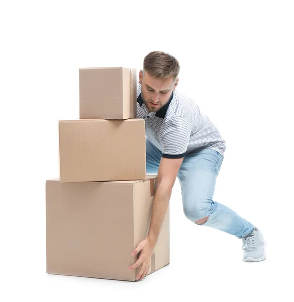 Retrato Cuerpo Entero Del Joven Levantando Cajas Cartón Sobre Fondo — Foto de Stock