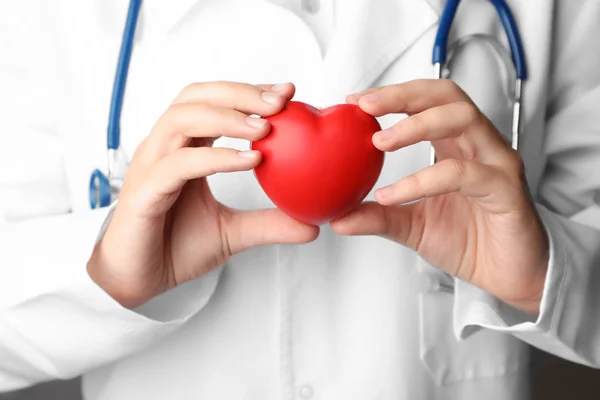 Doctor Holding Toy Heart Closeup Pulse Checking — Stock Photo, Image