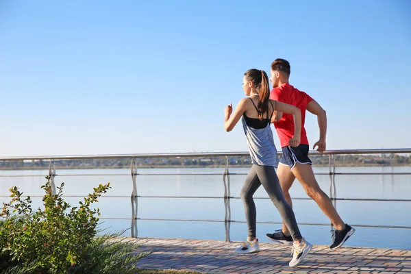 Sporty Couple Running Outdoors Sunny Morning — Stock Photo, Image