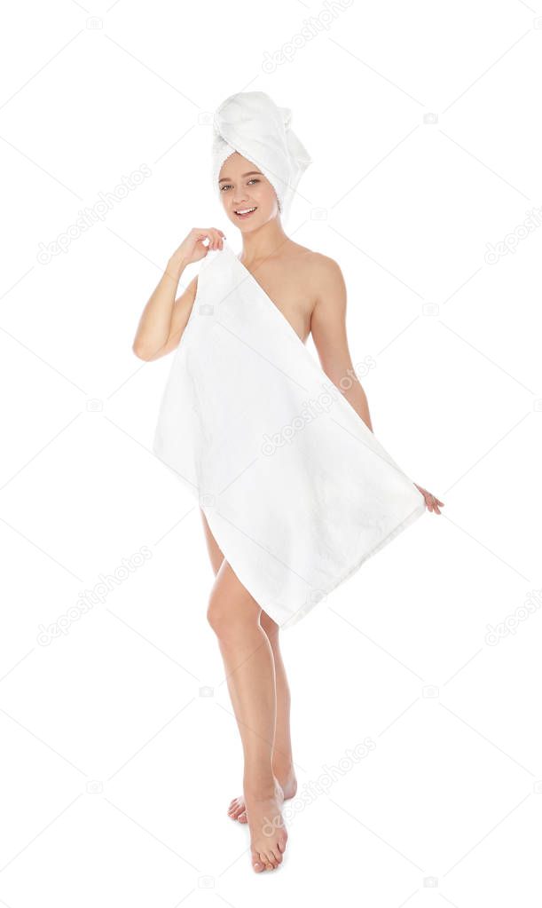 Full length portrait of young pretty woman with towels on white background