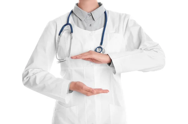 Kvinnliga Läkare Höll Något Vit Bakgrund Närbild — Stockfoto