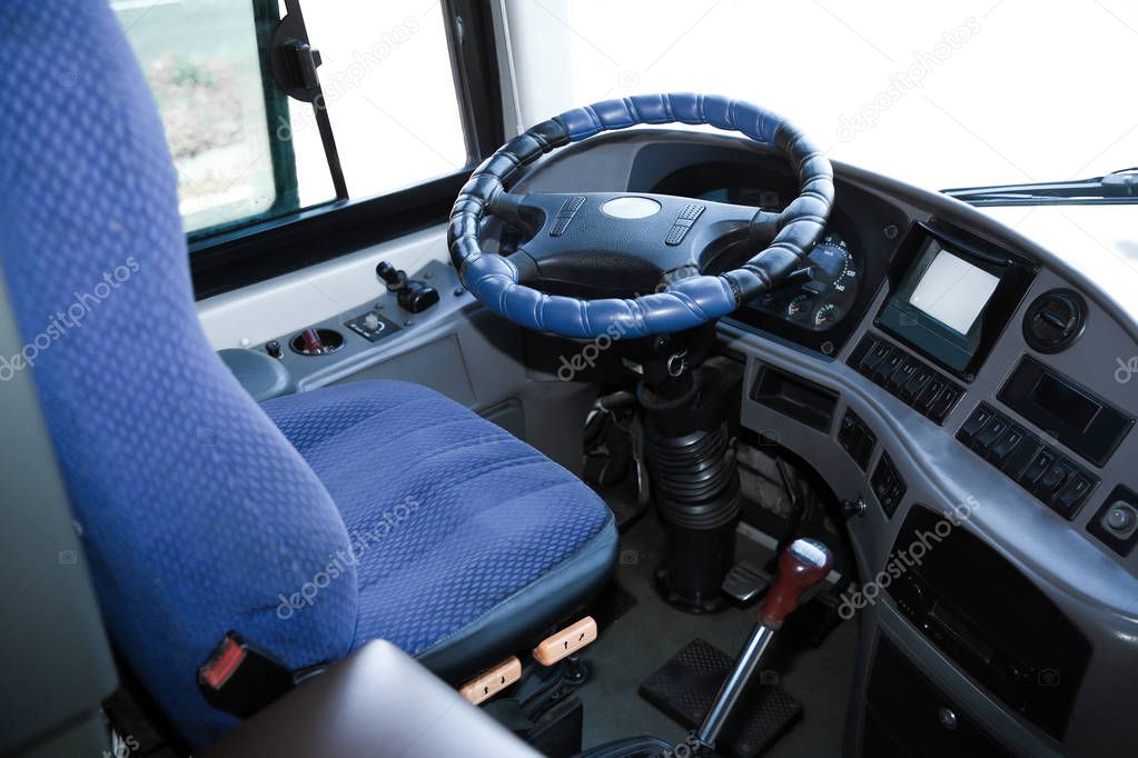 View of professional driver's cab in modern bus