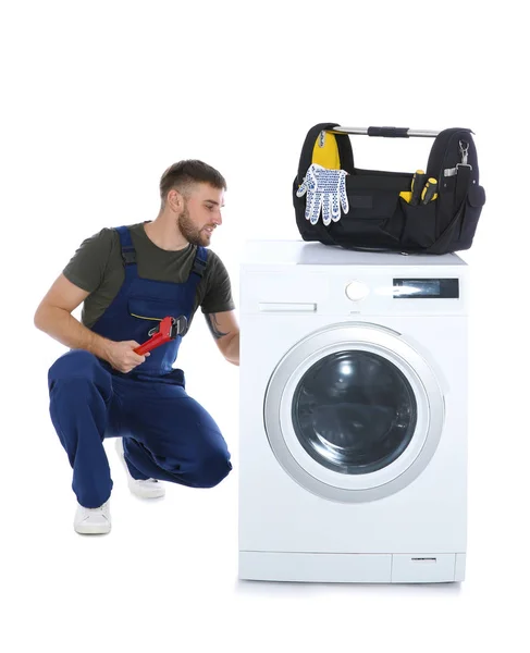 Plumber Fixing Washing Machine White Background — Stock Photo, Image