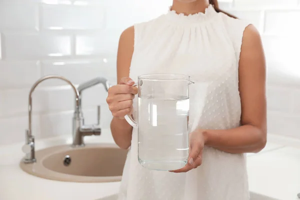 Woman Holding Glass Jug Water Kitchen Closeup — Stock Photo, Image