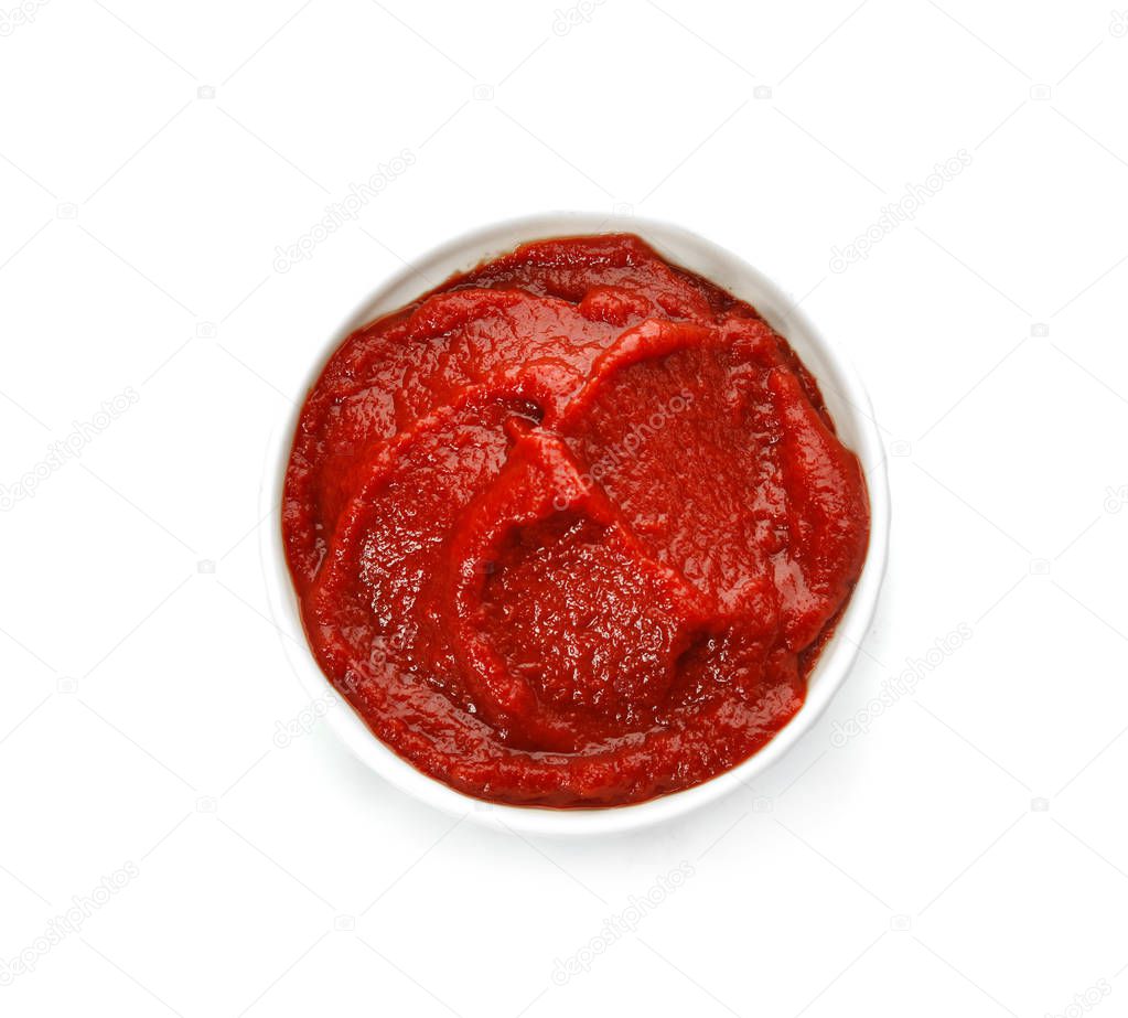 Tasty homemade tomato sauce in bowl on white background, top view