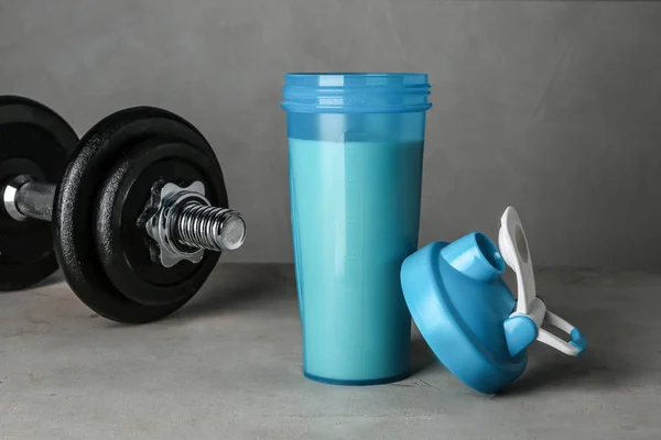 Bottle Protein Shake Dumbbell Grey Table — Stock Photo, Image