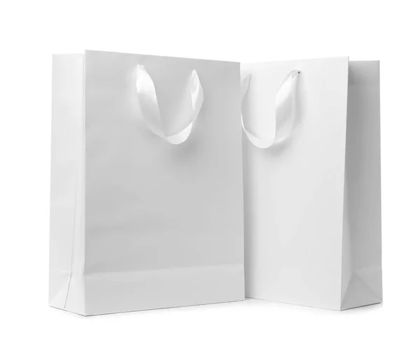 Χαρτί Τσάντες Αγορών Λαβές Κορδέλα Άσπρο Φόντο Κοροϊδεύω Για Σχεδίαση — Φωτογραφία Αρχείου