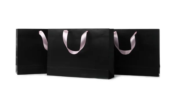 白い背景の上のリボン ハンドルと紙のショッピング バッグ デザインのモックアップ — ストック写真