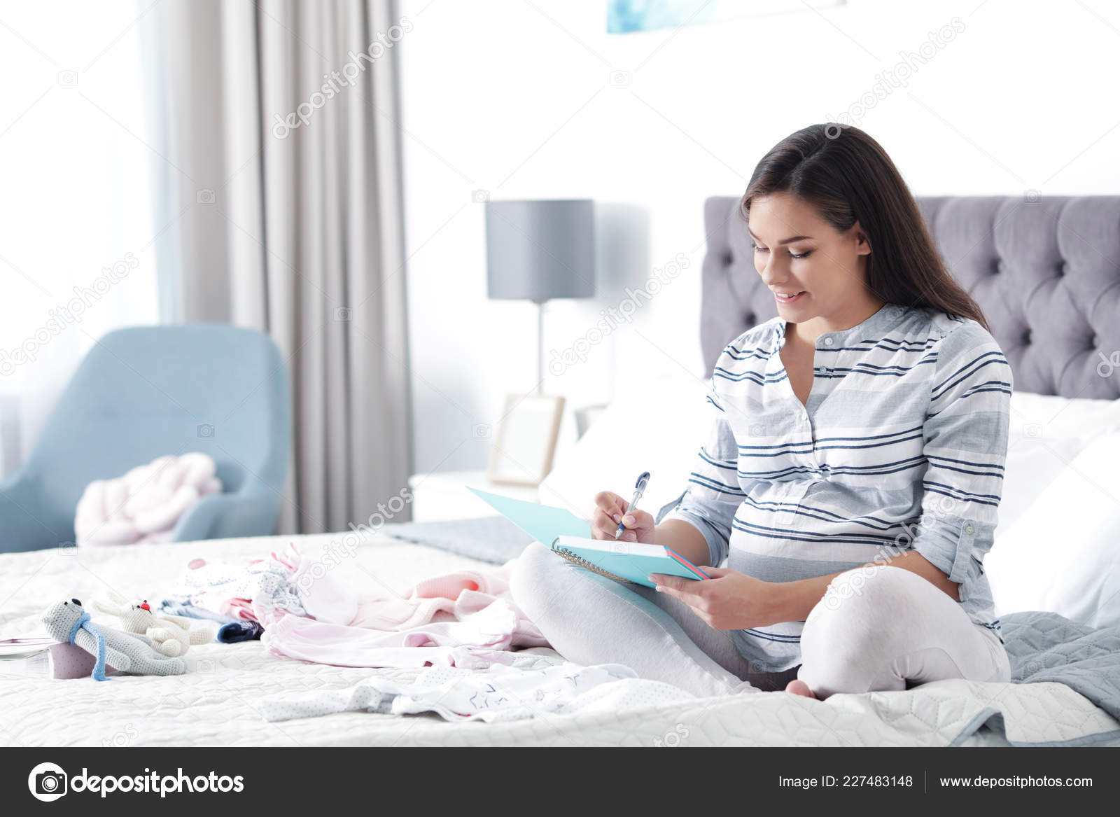 Pregnant Woman Writing Packing List Maternity Hospital Bed Home