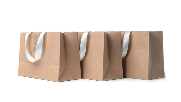 Einkaufstaschen Aus Papier Mit Bändchen Auf Weißem Hintergrund Design Attrappe — Stockfoto