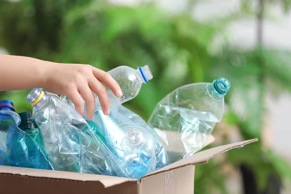 Woman Putting Used Plastic Bottle Cardboard Box Blurred Background Closeup — Stock Photo, Image