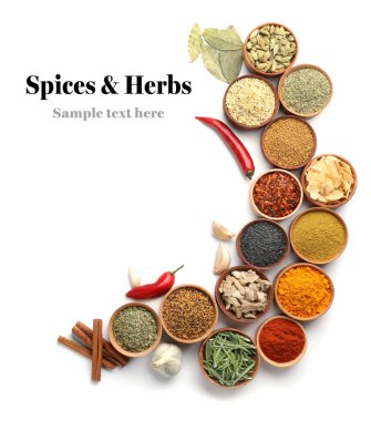 Set of different spices and herbs with space for text on white background, top view clipart